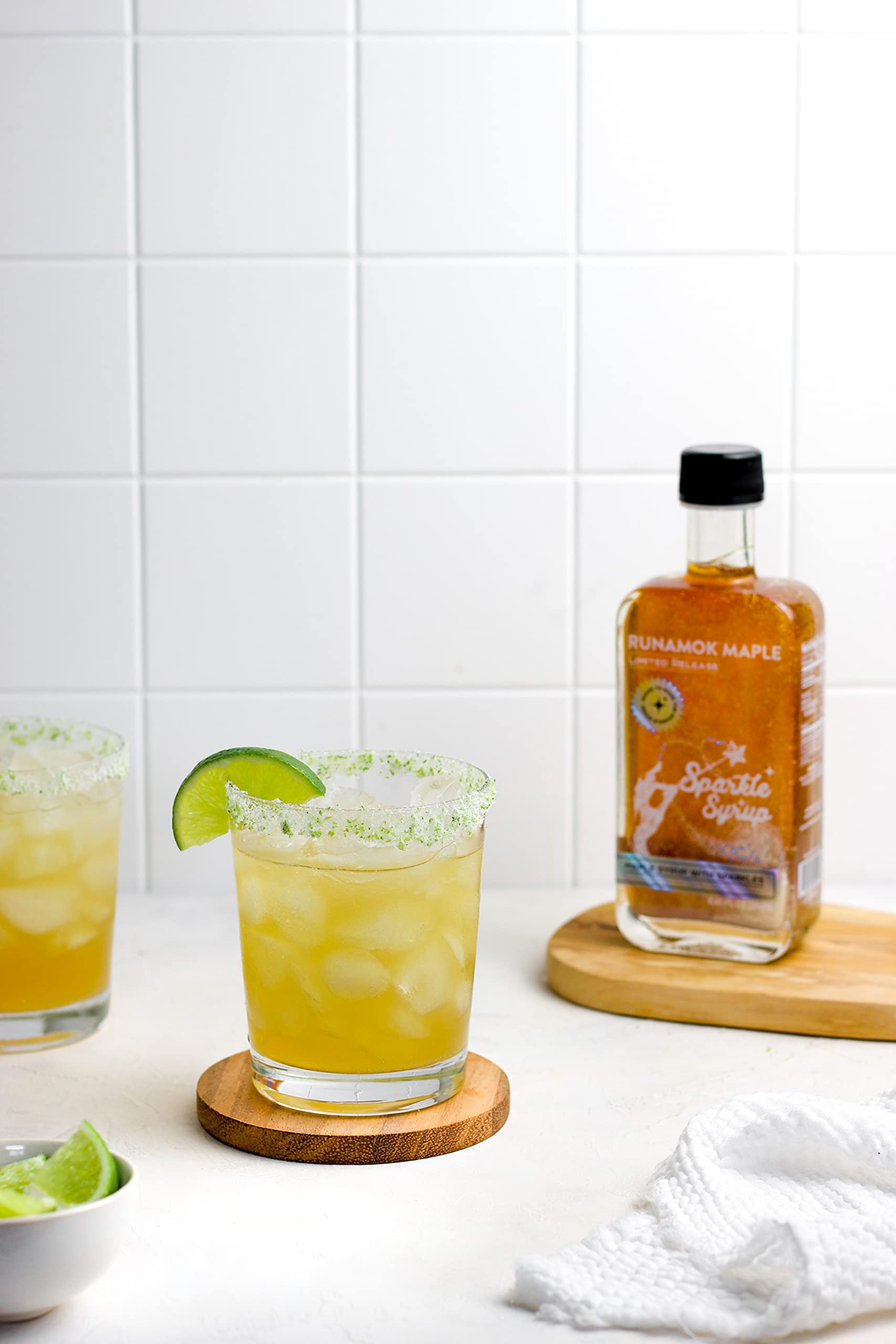 Runamok pouring sparkle syrup over pancakes for eye-catching breakfast