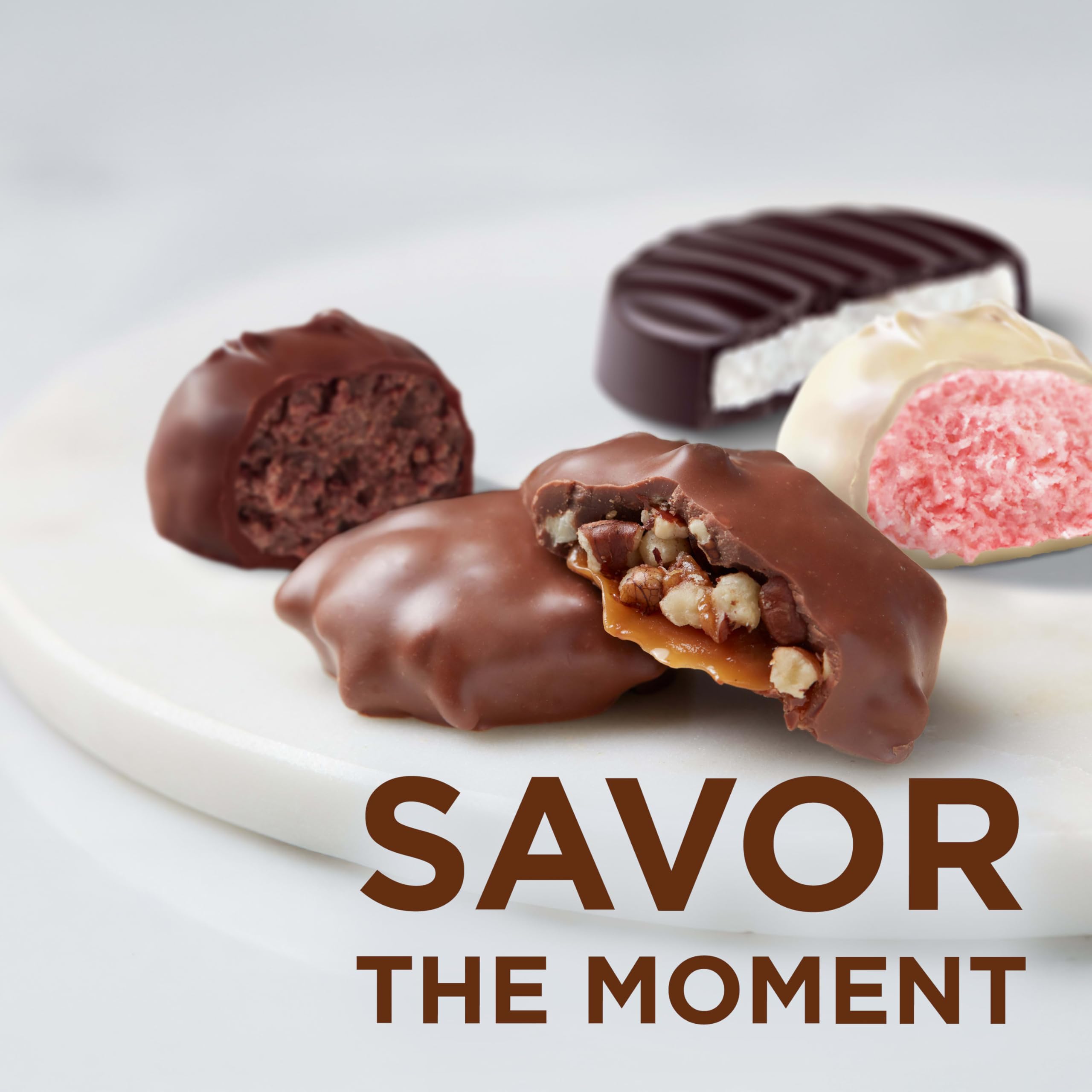 Russell Stover milk pecan delight close-up showing crunchy pecans and caramel in milk chocolate