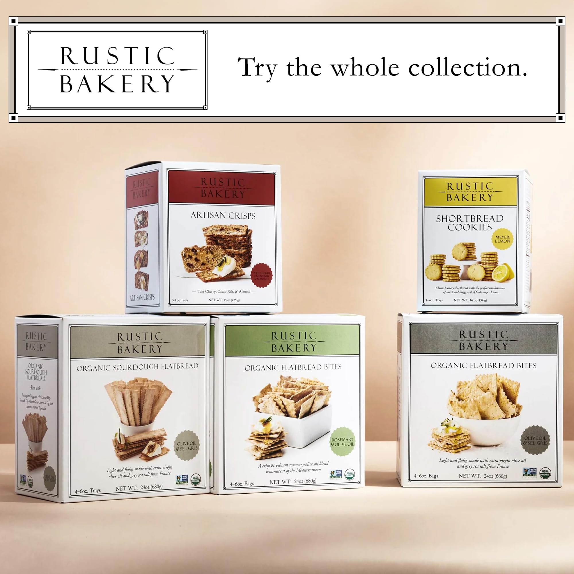 Rustic Bakery crackers next to a hand to show bite-size scale and convenience