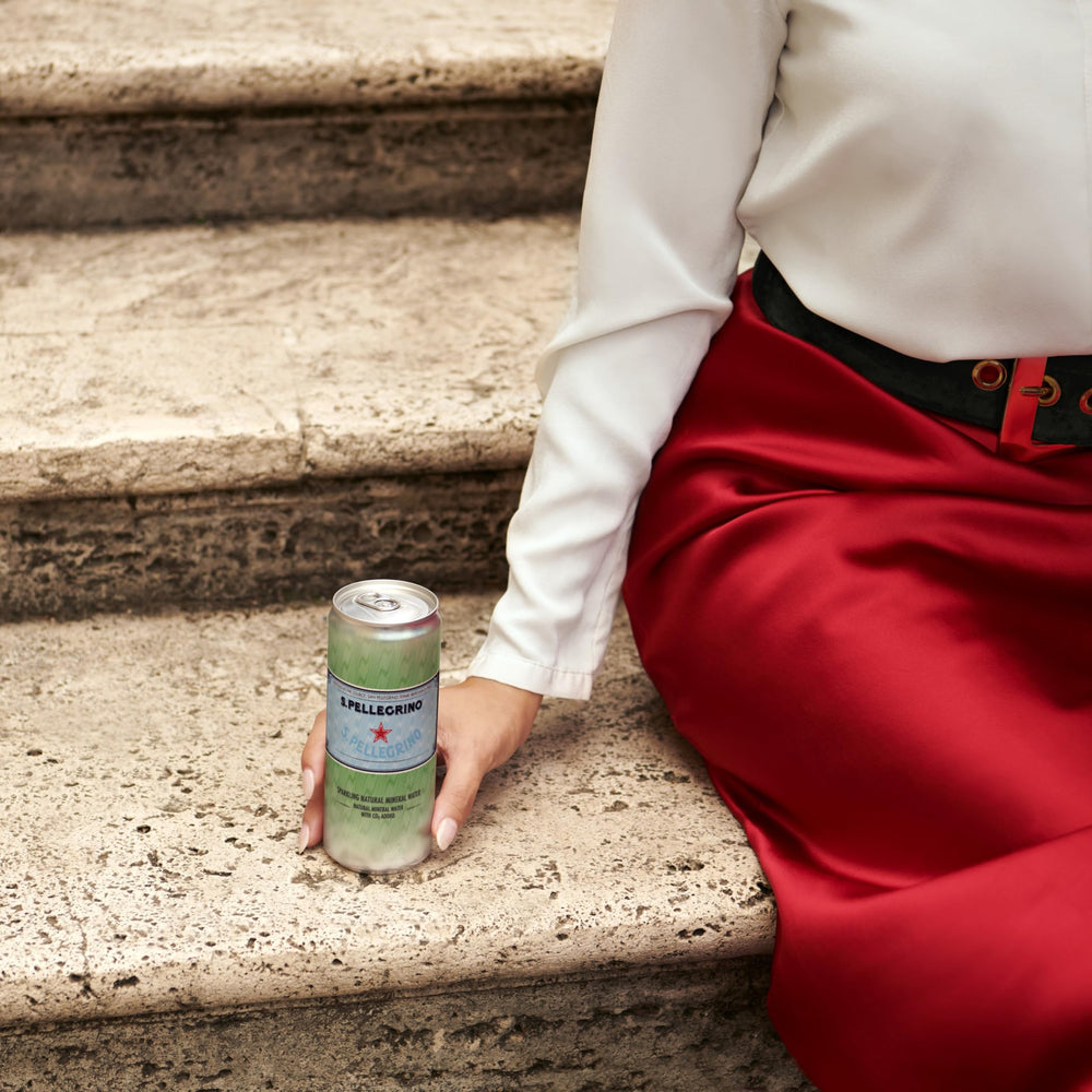 S.Pellegrino twenty-four cans stacked neatly for storage and party readiness