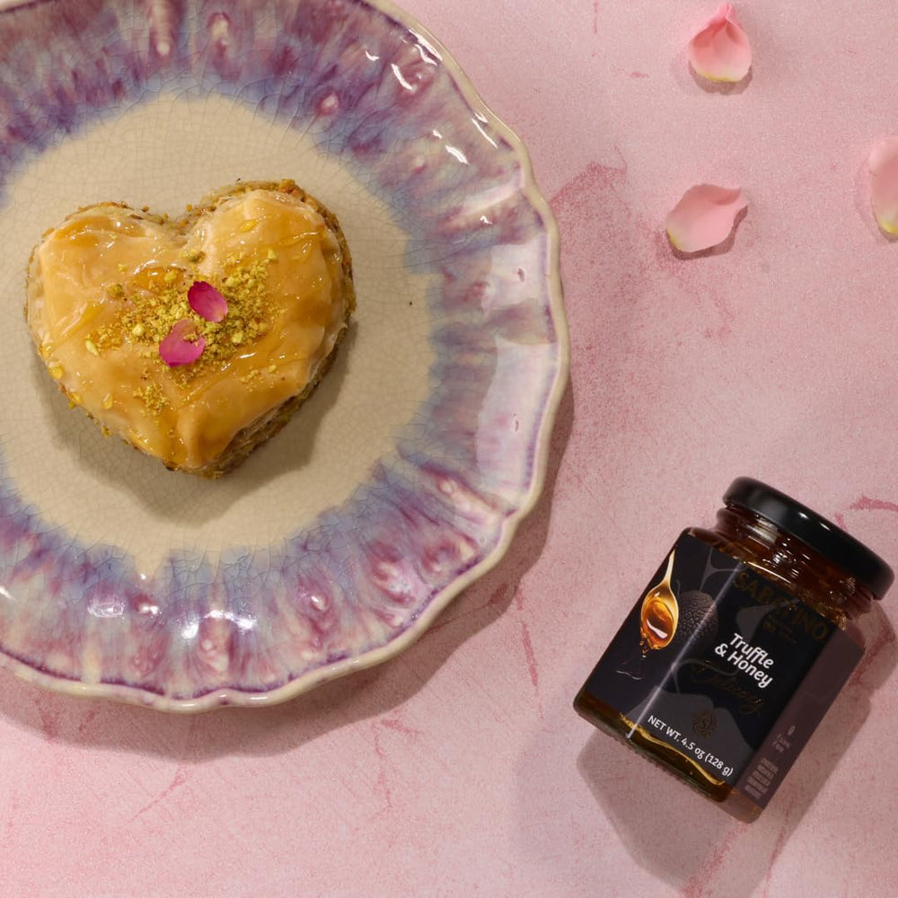 Sabatino Tartufi jar on cheese board highlighting pairing benefit