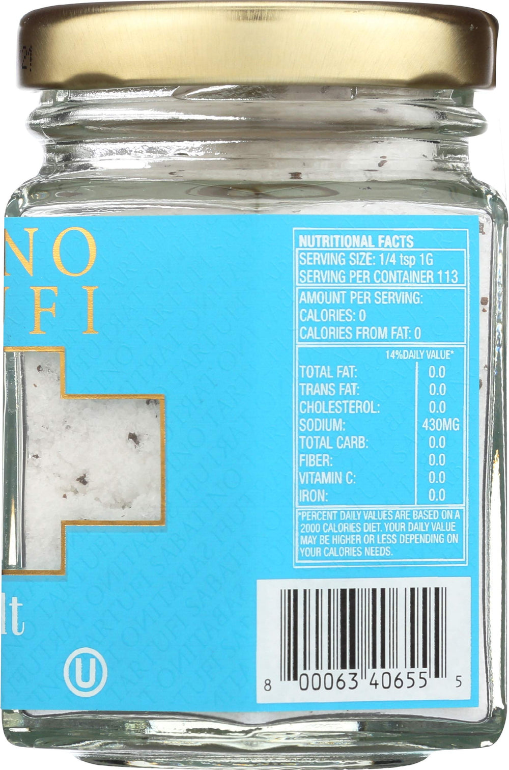Sabatino Tartufi jar beside a measuring spoon showing the 4 oz scale