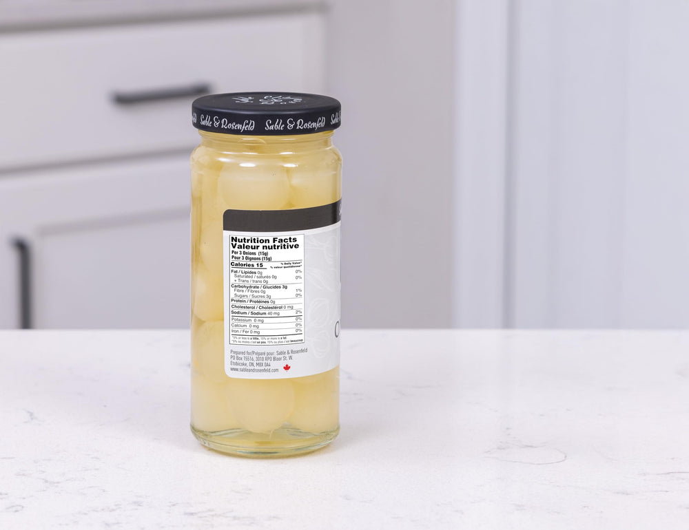 Sable & Rosenfeld 5 oz jar next to measuring scale showing compact portable size