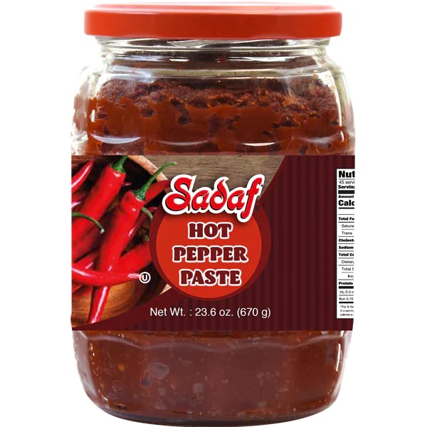 Sadaf jar front view showing deep-red paste for bold flavor
