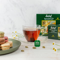 sadaf brewed tea pouring from teapot highlighting rich color