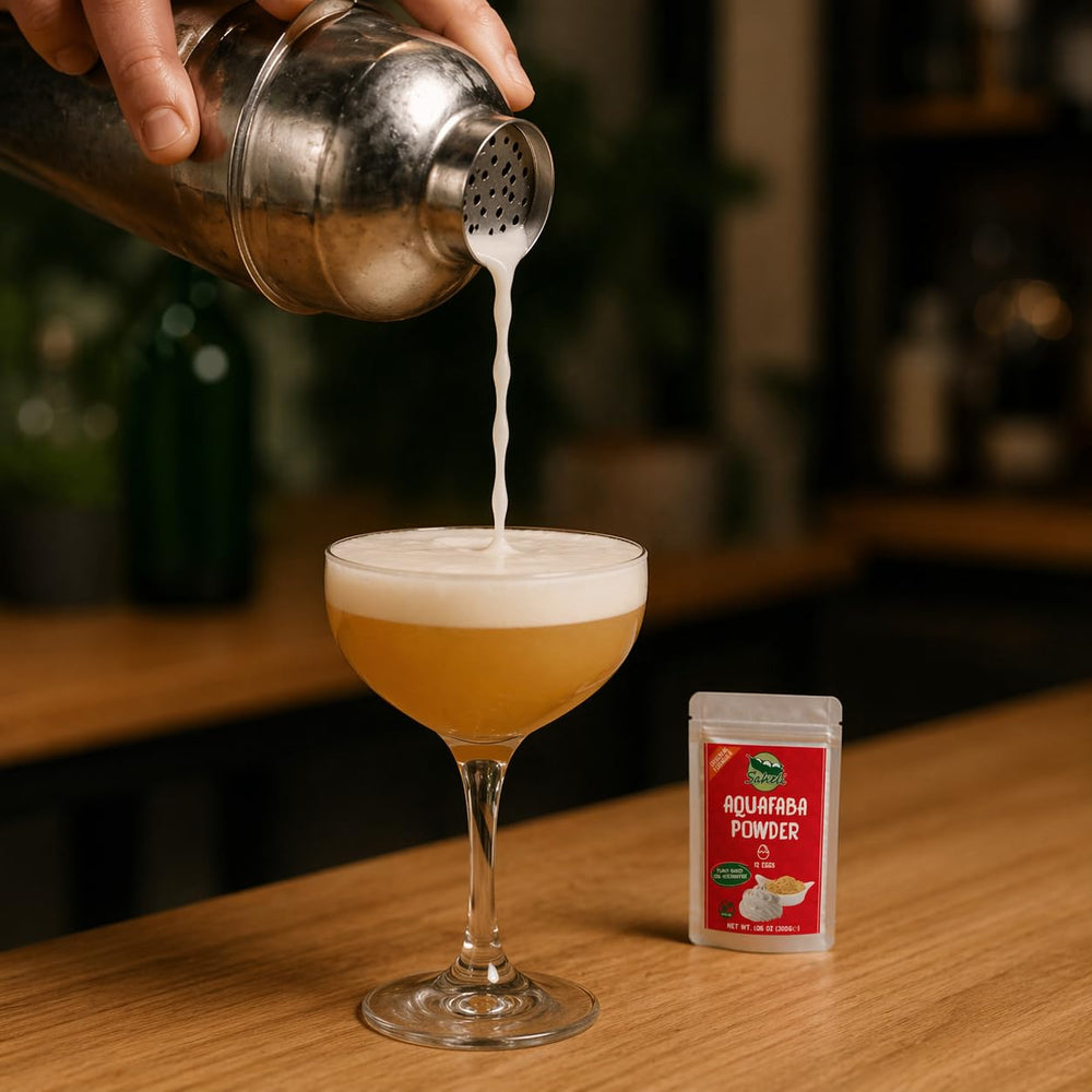Saheli aquafaba whipped foam topping a cocktail demonstrating stable foam