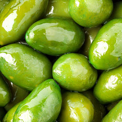 Sanniti close-up of a single Bella di Cerignola olive, highlights meaty flesh