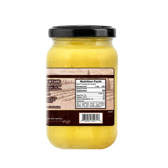 Sanniti Dijon being spread on toast to boost flavor and everyday meal enjoyment