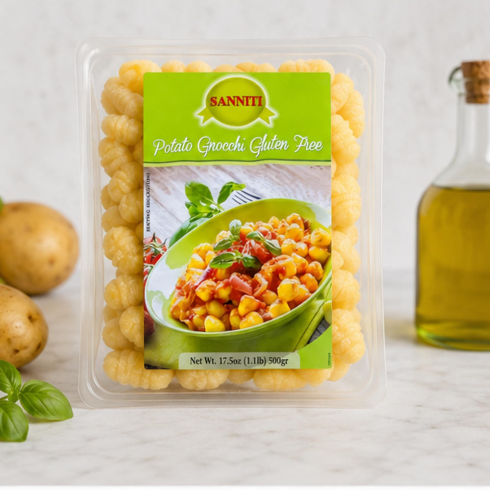 Sanniti family dinner serving with gnocchi on table portraying easy entertaining and crowd-pleasing