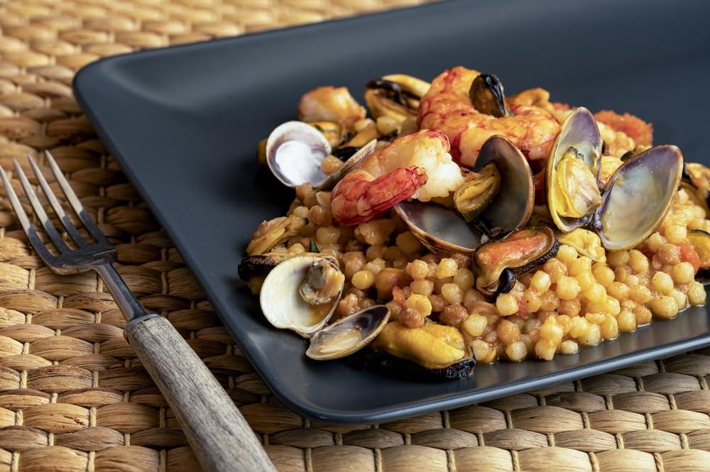 Sanniti fregola next to measuring cup showing pack portion and serving clarity