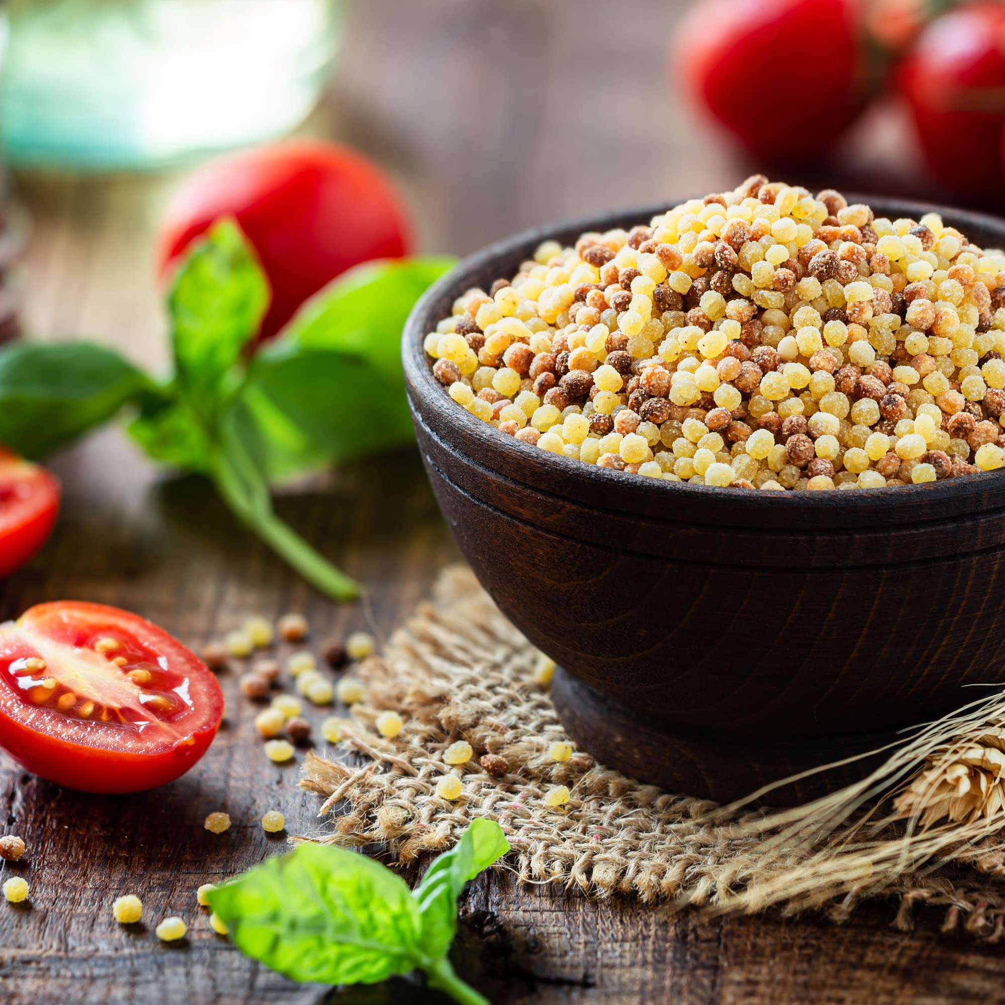 Sanniti fregola plated in seafood stew showing pairing and flavor harmony