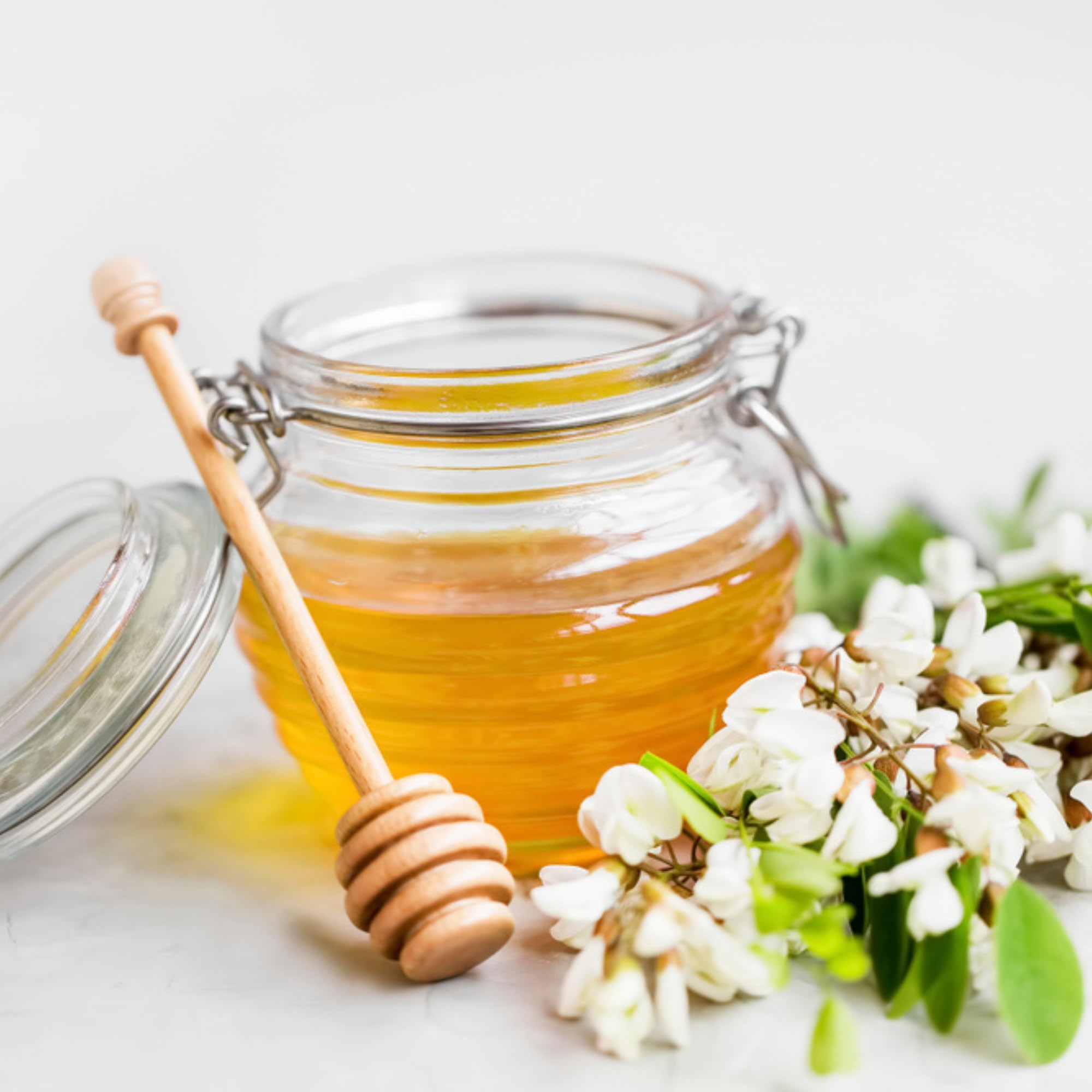 Sanniti Fulmer honey stirred into tea cup, enhances beverage sweetness naturally