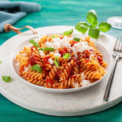 Sanniti fusilli beside kitchen scale showing single-portion size