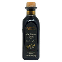 Sanniti bottle front view showing Premium Aged Gold Seal branding and dark color benefit