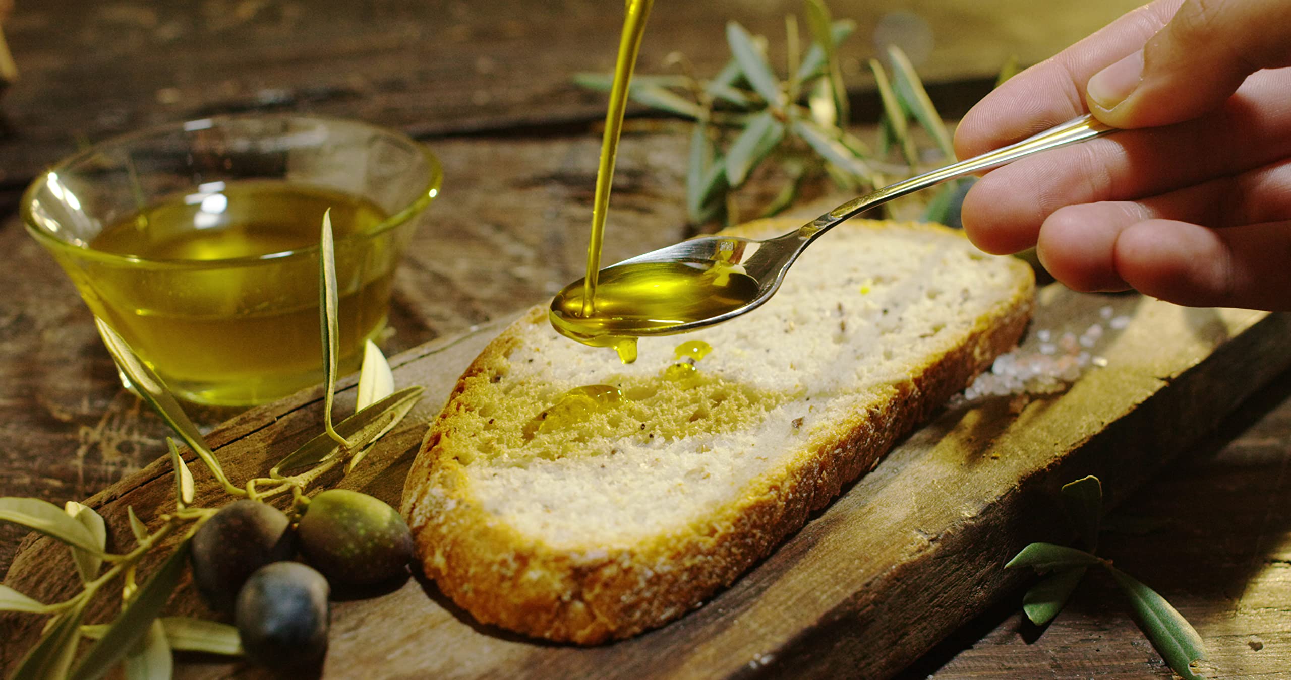 Sanniti olive oil drizzled on bruschetta for bright finishing flavor
