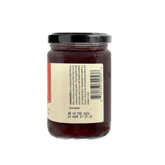 Sanniti spoonful of lingonberries close-up showing berries and balanced sweetness