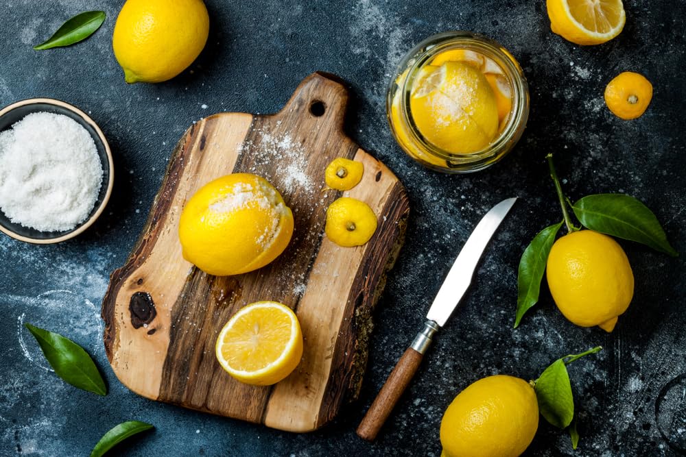Pouring Sanniti brine into spoon to demonstrate seasoning and marinade use