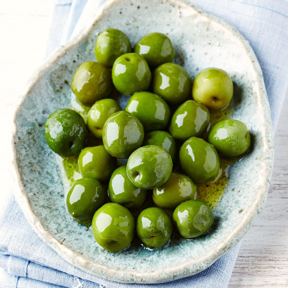 Sanniti salad topped with Castelvetrano olives adding mild savory flavor