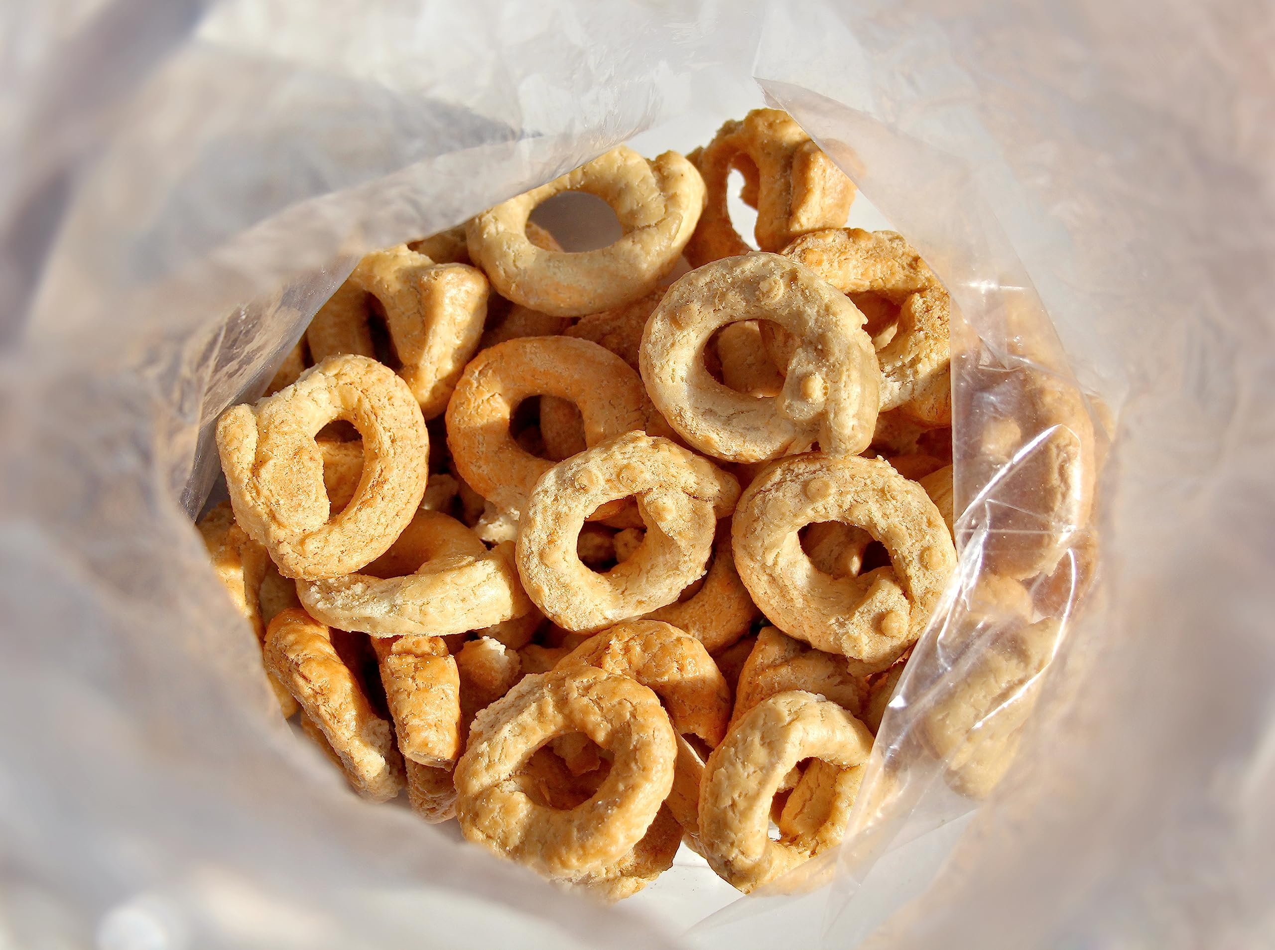 Sanniti taralli styled with cheese and olives for entertaining appeal