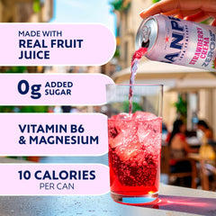 San Pellegrino pouring into glass with ice showing vibrant strawberry color and fizz