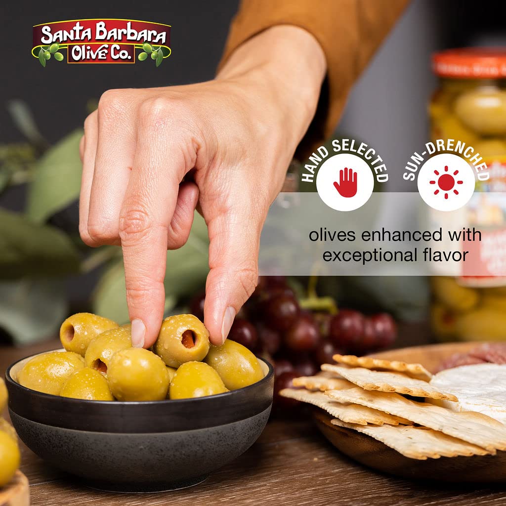 SANTA BARBARA OLIVE CO jar beside fork for size comparison and scale