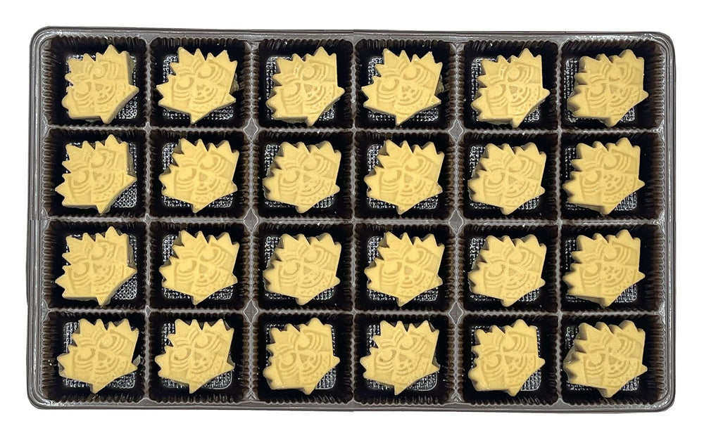 Sapsquatch single maple leaf candy on spoon highlighting portion size and flavor