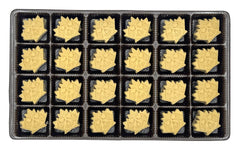 Sapsquatch single maple leaf candy on spoon highlighting portion size and flavor