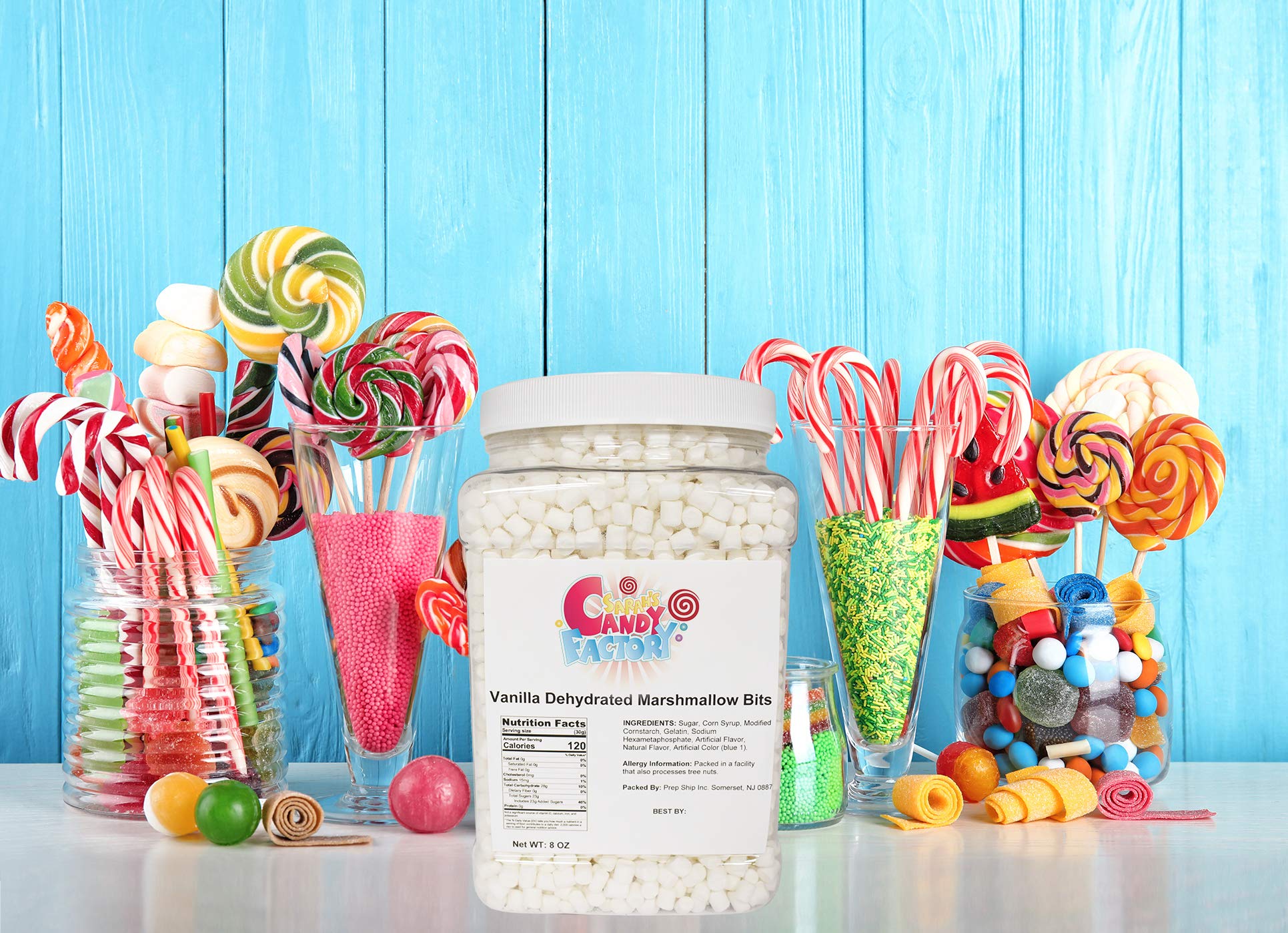 Sarah's Candy Factory open jar with spoon measuring marshmallow bits for easy portioning