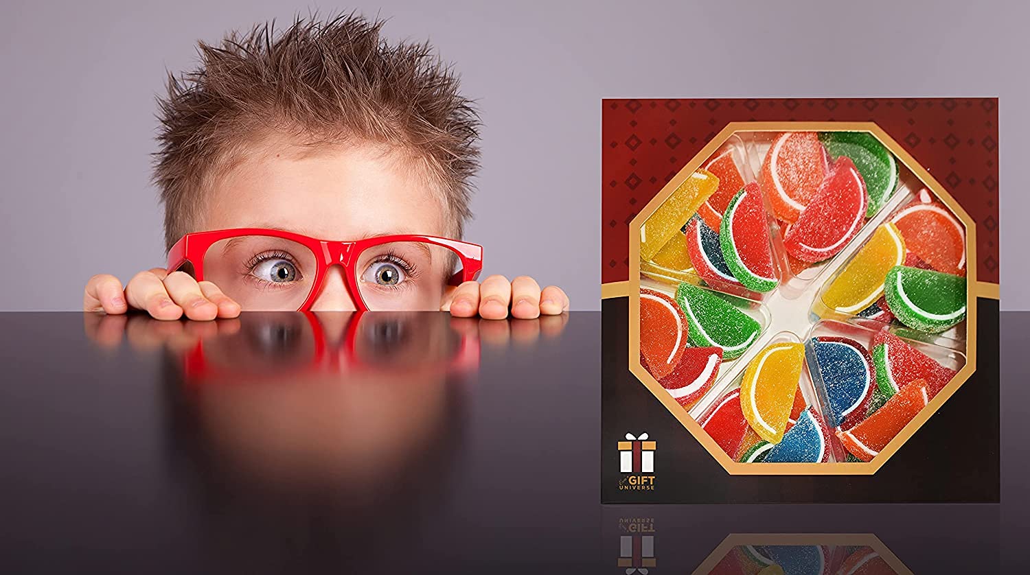 Sarah's Candy Factory hand holding a slice showing size and portion guidance