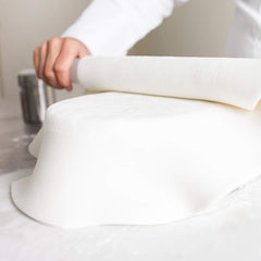 Satin Ice Tropical fondant pulled to show elasticity and flexible working time