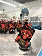 Sauce Crafters drops on spoon demonstrating concentrated additive for precise dosing