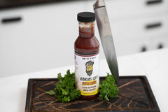 Sauce King close-up texture of thick smoky sauce showing cling and glaze potential
