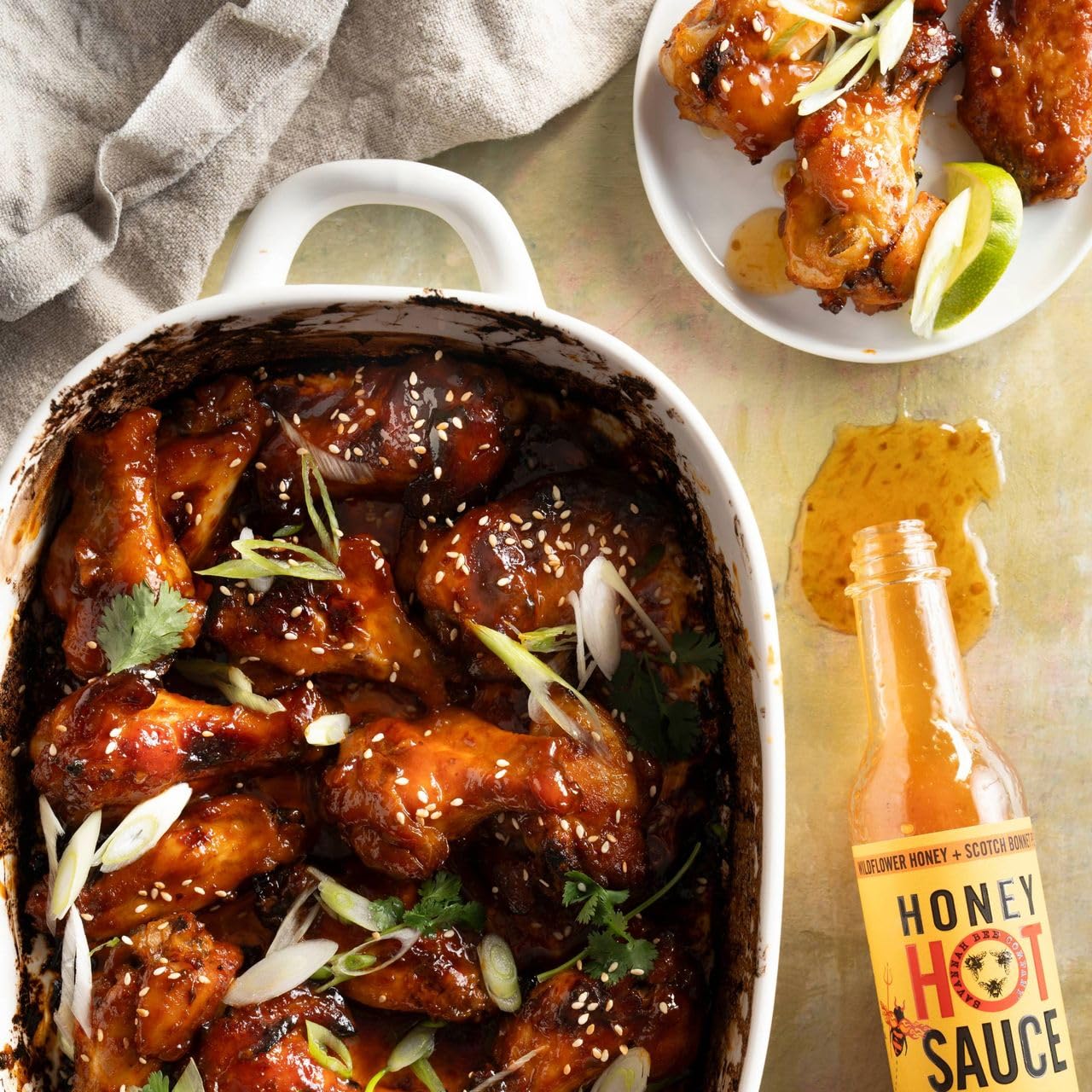 Slice of pizza topped with Savannah Bee Company hot honey adding sweet heat and balance