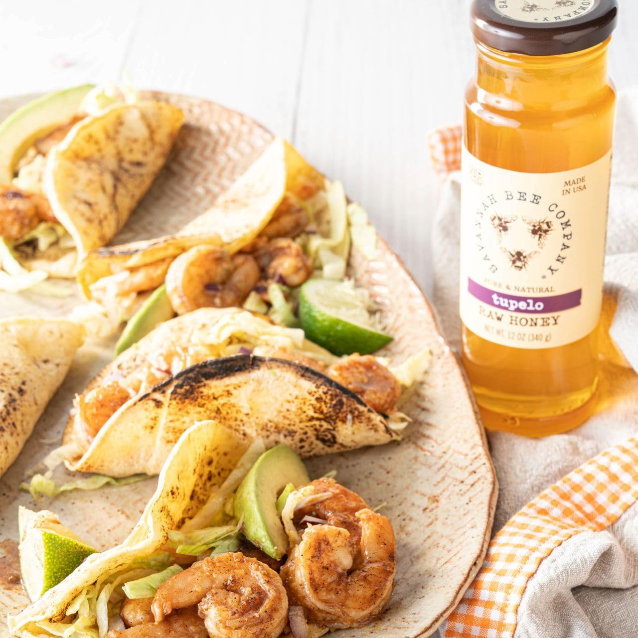 Savannah Bee Company honey drizzling over toast showing smooth pour and gourmet flavor