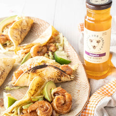 Savannah Bee Company honey drizzling over toast showing smooth pour and gourmet flavor