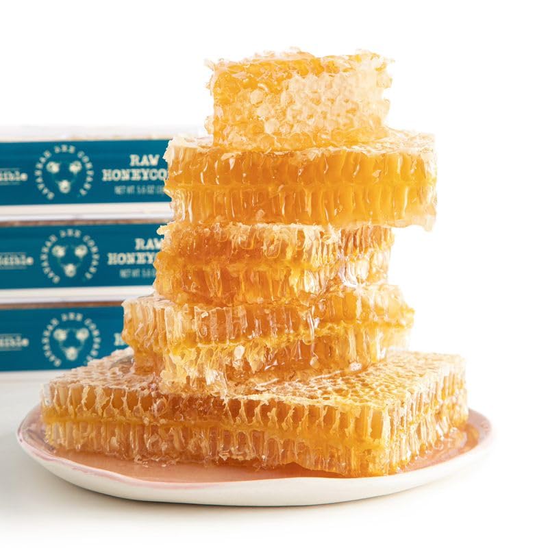 Savannah Bee Company honeycomb on a spoon ready to taste and enjoy