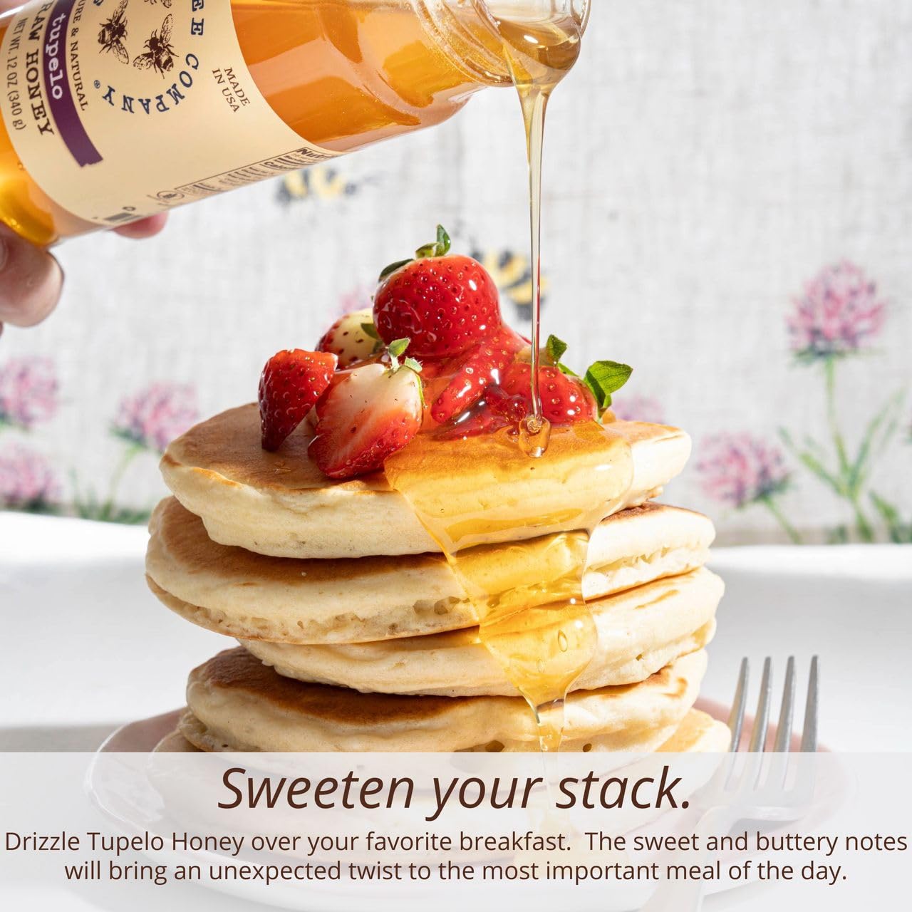 Savannah Bee Company label close-up highlighting Tupelo origin and raw honey details