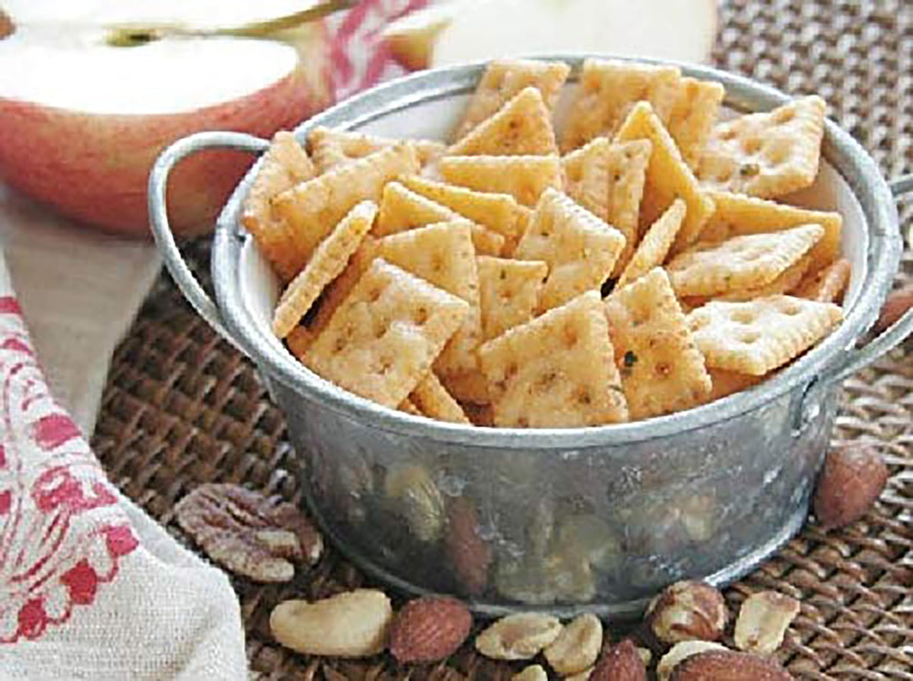 Savory Fine Foods packet held in hand demonstrating compact travel size