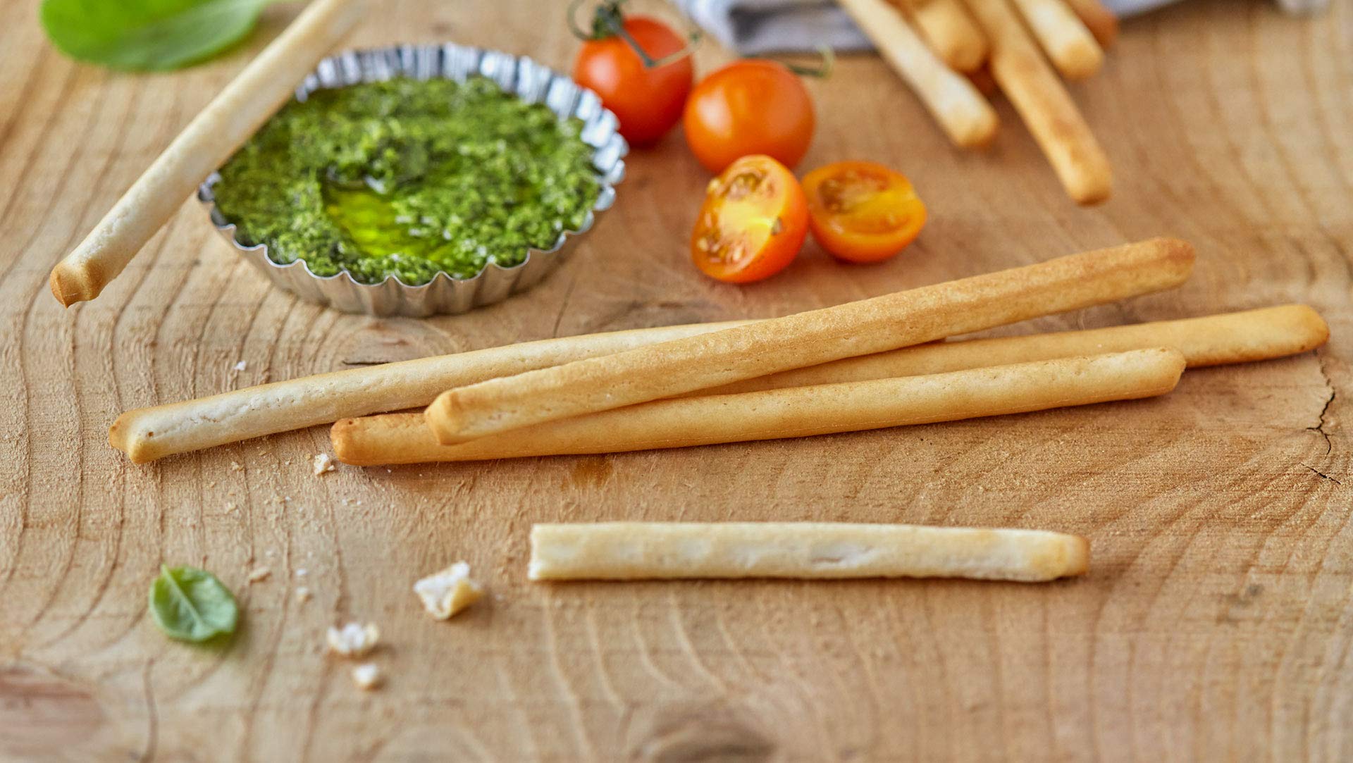 Three Schär 50 g breadsticks packs grouped to show bundle quantity and portability