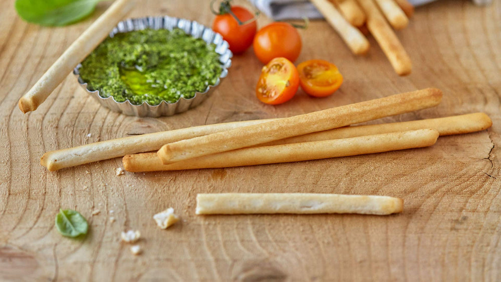 Three Schär 50 g breadsticks packs grouped to show bundle quantity and portability