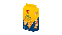 Schär crackers paired with soup showing compatibility and convenient snacking