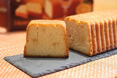 Schlünder orange liqueur cake close-up slice revealing moist texture and bright citrus benefit