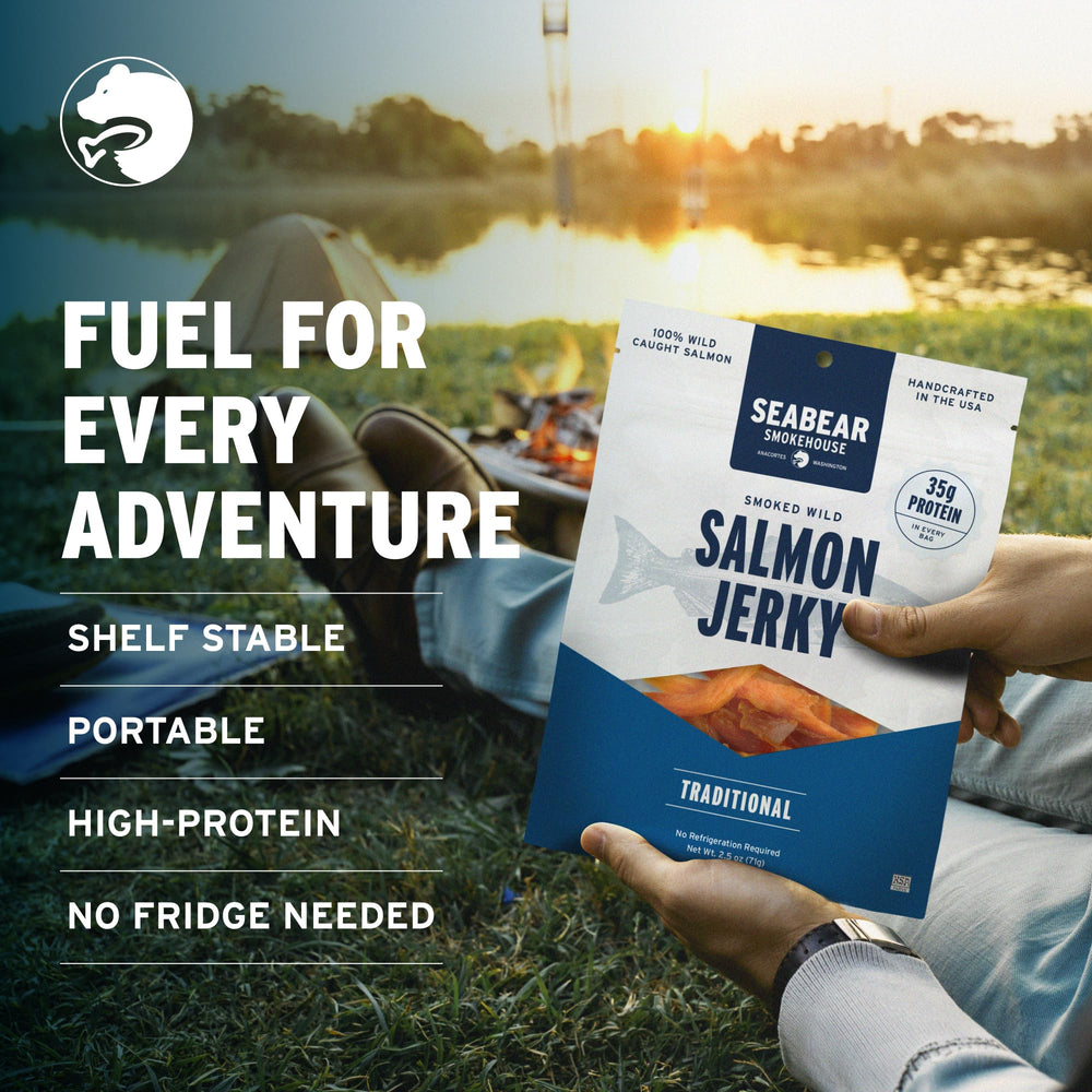 SeaBear open pouch on a hiking trail being eaten to show shelf-stable snack convenience
