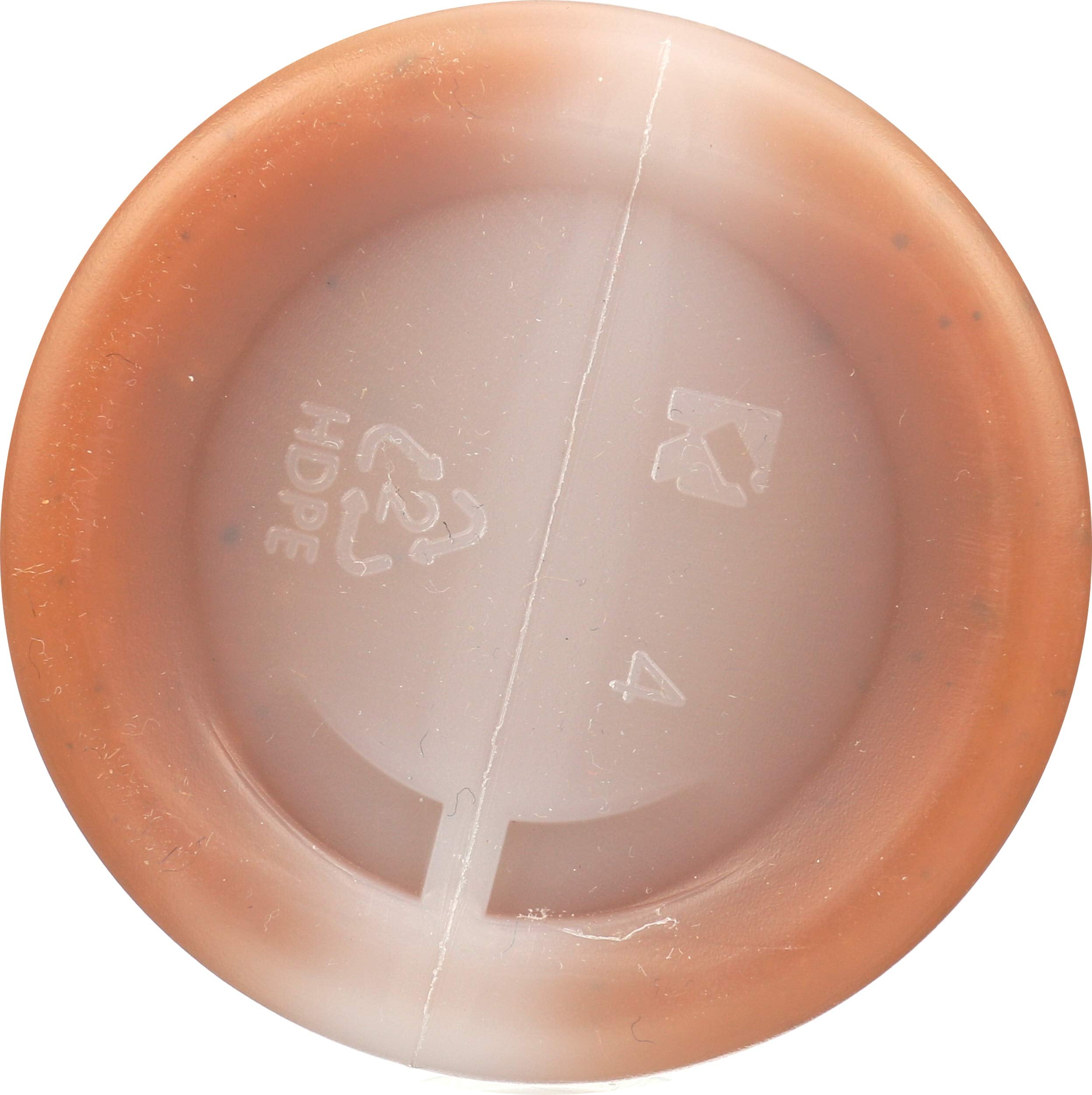 Secret Aardvark bottle next to drinking glass showing 8 fl oz scale