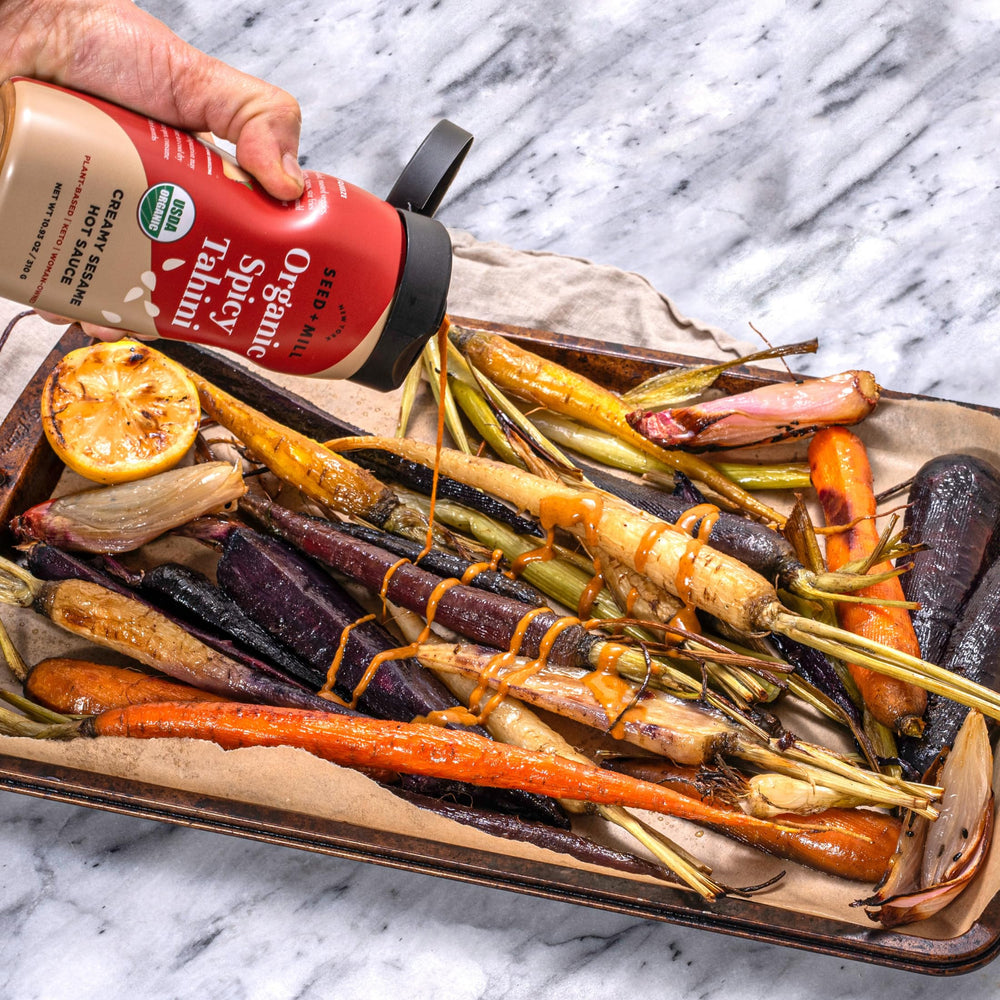 Seed + Mill spicy tahini drizzled on toast adding savory heat and creaminess