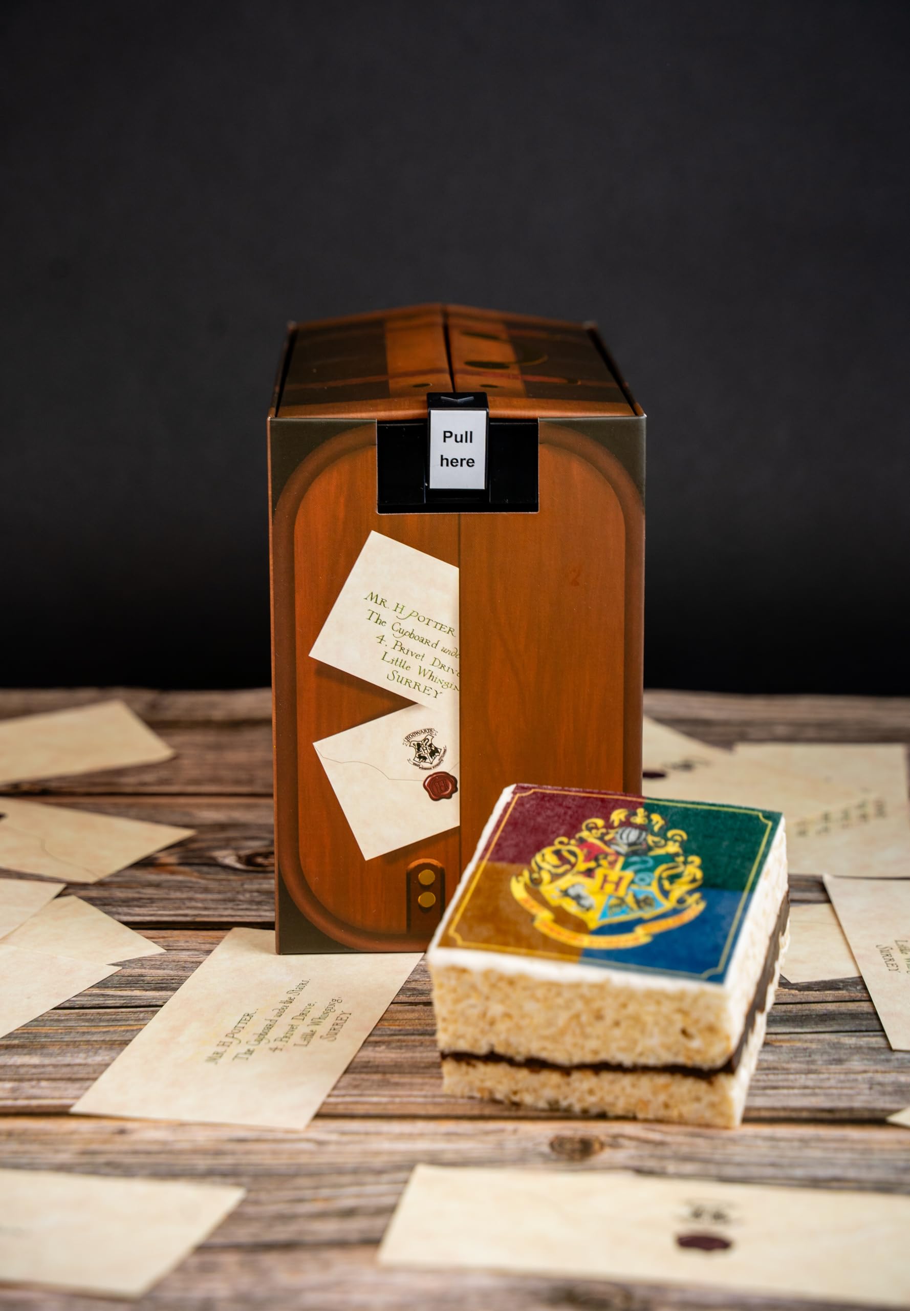 Send A Cake explosion box on party table creating festive atmosphere and photo ops