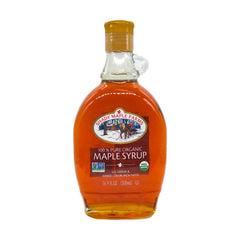 Shady Maple Farm texture on spoon showing thick, amber syrup and visual quality