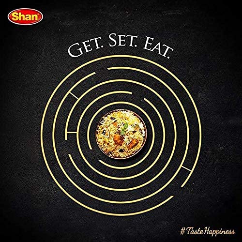 Shan-seasoned biryani plated in a home setting promising rich, authentic taste