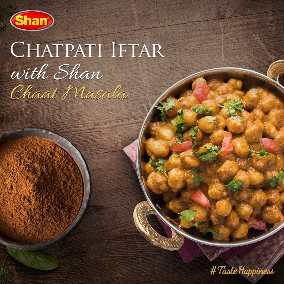 Shan chaat masala on spoon highlighting easy sprinkle and control