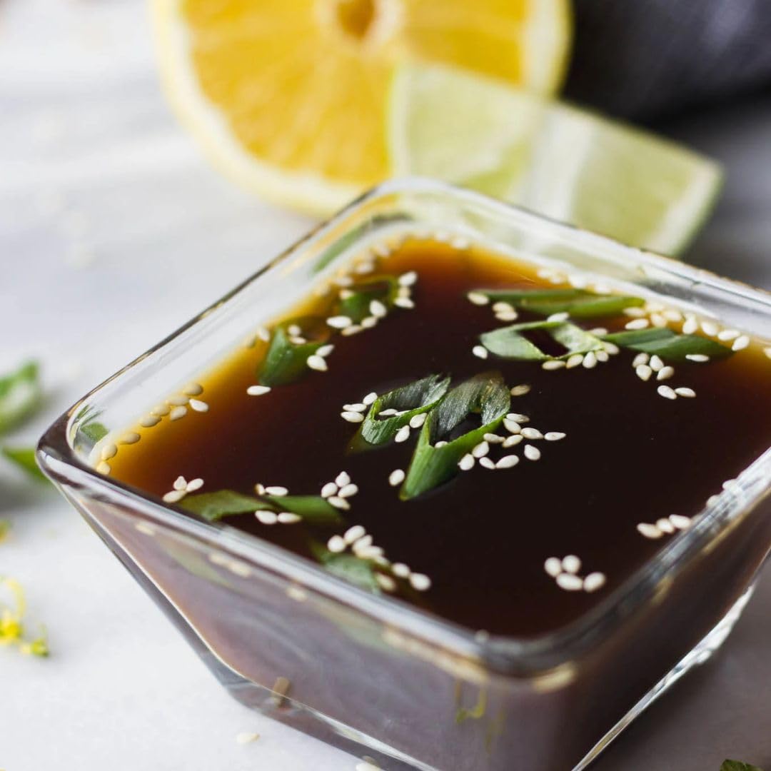 Close-up of fresh yuzu fruit and bonito flakes highlighting Shibanuma natural ingredients
